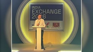Harsh Mariwala at podium during India Exchange 2026 conference with event branding in the background.